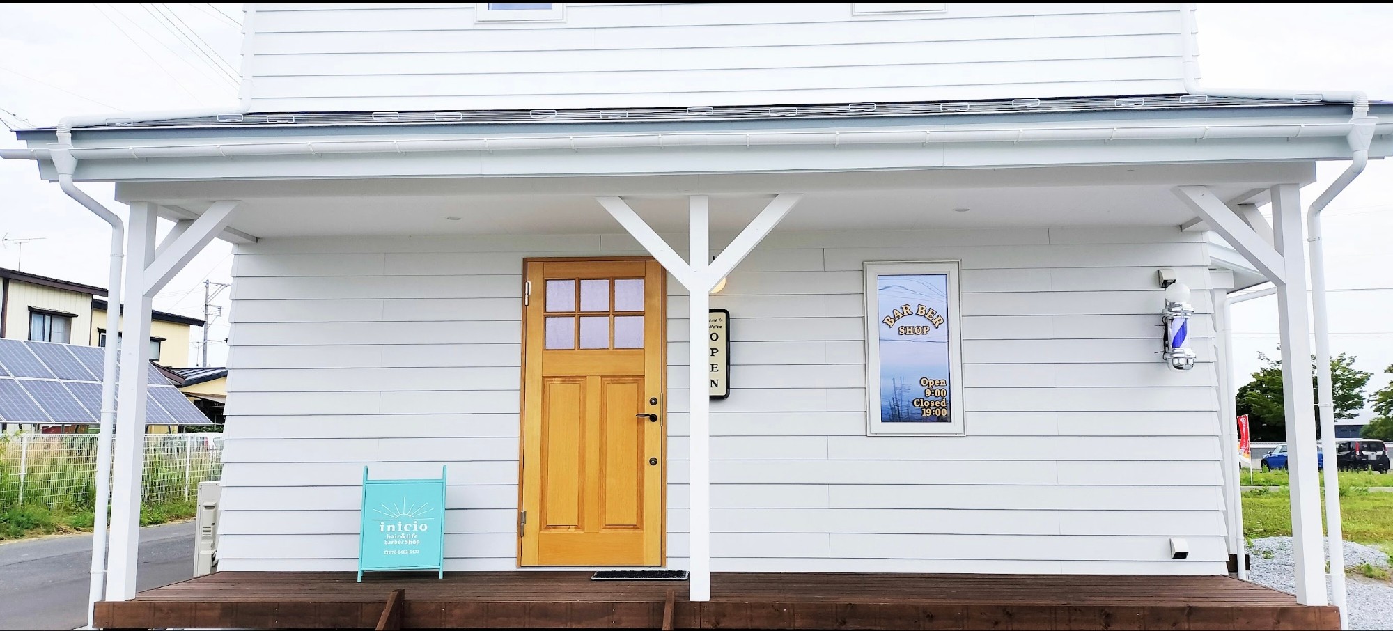inicio shop porch and yellow door